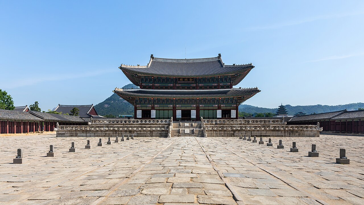 Front view of the Imperial Throne Hall Geunjeongjeon at Gyeongbokgung Palace with blue sky in Seoul.jpg